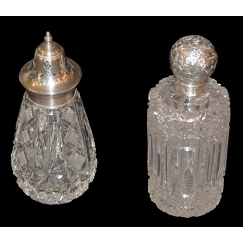 589 - A Silver Topped Sugar Shaker and a Silver Top Perfume Bottle