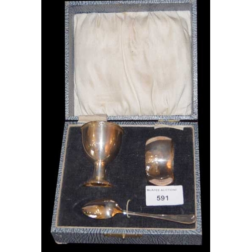 591 - A Nice Cased Silver Egg Cup, Spoon and Napkin Ring, Sheffield 1929