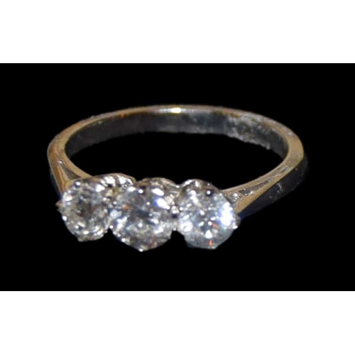 645 - A Platinum Three Stone Diamond Ring