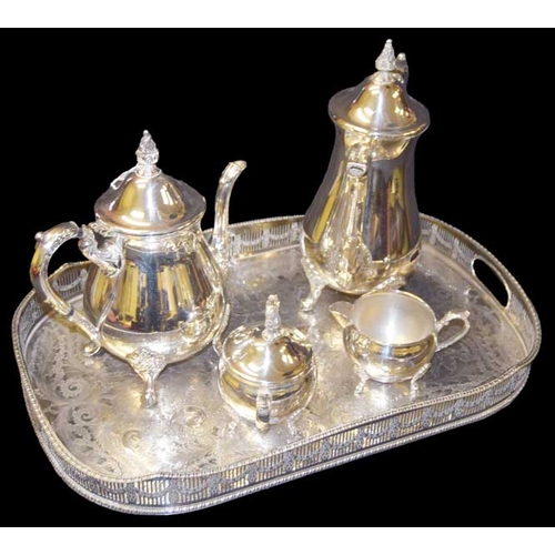 67 - A Four Piece Silverplated Tea Service and  a Two Handled Silver Plated Gallery Tray