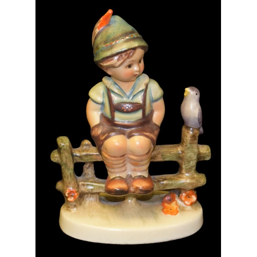 259 - A Hummel Figurine 'Boy on Stile'