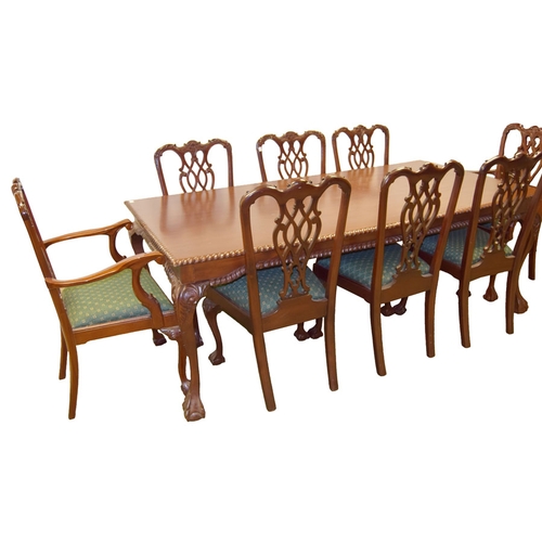 500 - A Mahogany Dining Room Table and Eight Matching Chair Set including Two Carvers