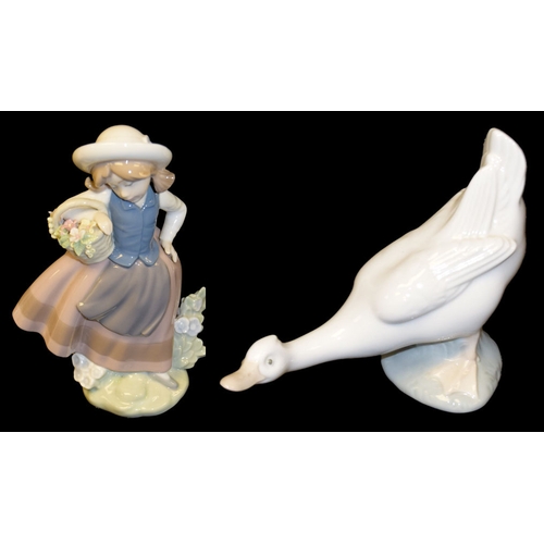 619 - A Lladro Figurine 'Girl with Basket' and a Nao 'Goose'