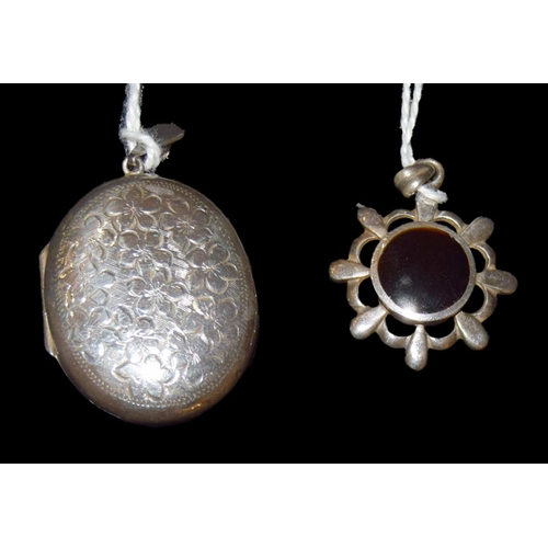 750 - A Silver Pendant and a Silver Locket