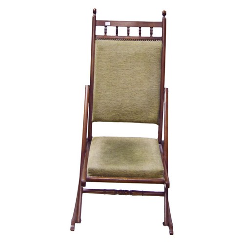 221 - A Folding Upholstered Rocking Chair