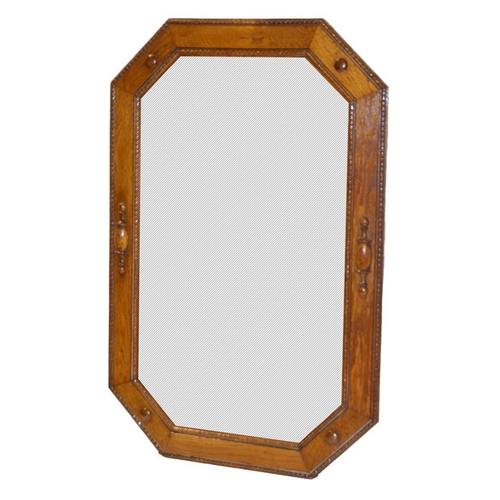 361 - An Octagonal Oak Framed Bevelled Glass Wall Mirror