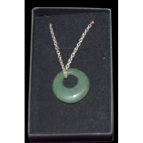 472 - A Jade Pendant on Silver Chain