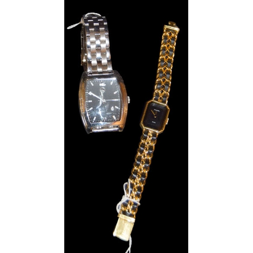 513 - A Ladies and a Gents Wrist Watch