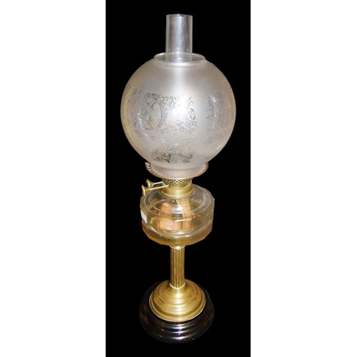 141 - A Brass Based Oil Lamp and Shade