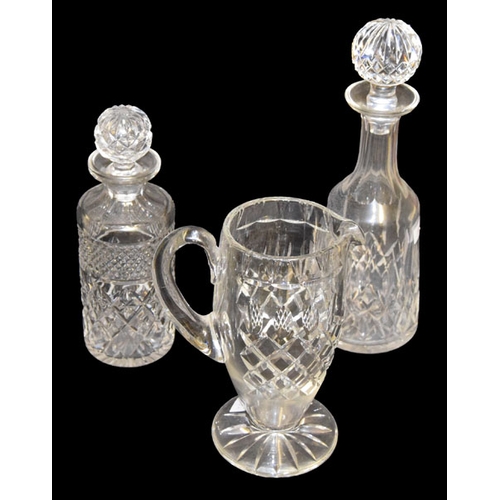 146 - An Early Water Jug and Two Decanters