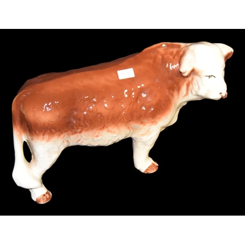 169 - A Large Figurine of A Hereford Bull