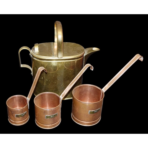 194 - An Old Watering Can and Three Copper Measures