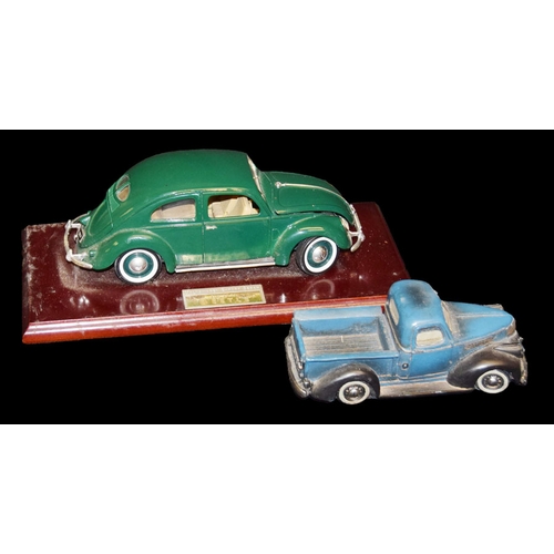 279 - A Model of A Volkswagen Beetle and A Small Truck