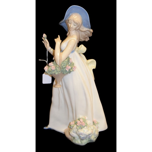 301 - A Large Porcelain Figurine 'Lady With Flowers'