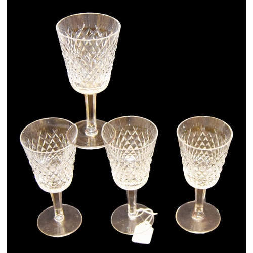 327 - A Set of Four Waterford Crystal Wine Glasses