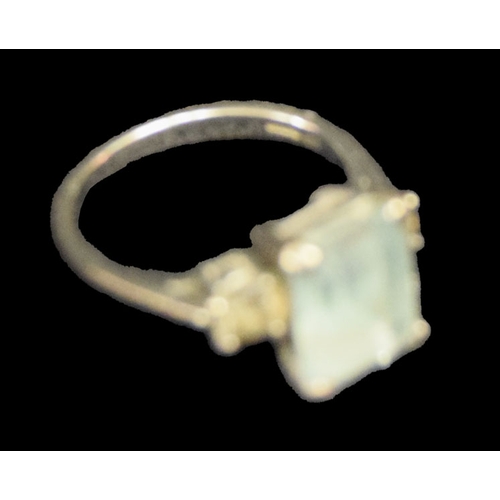 799 - An 18ct Gold Aquamarine and Diamond Ring