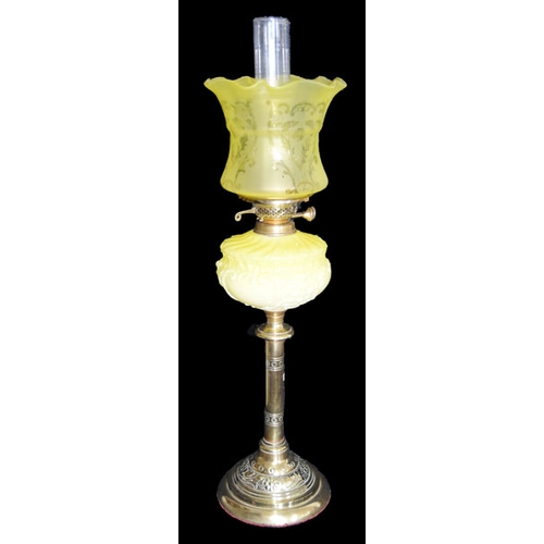 10 - A Victorian Oil Lamp with Yellow Reservoir and Shade