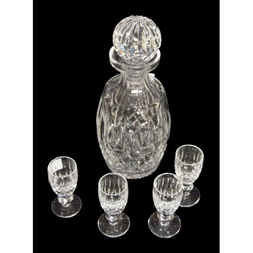 67 - A Waterford Crystal Decanter and Four Waterford Glasses