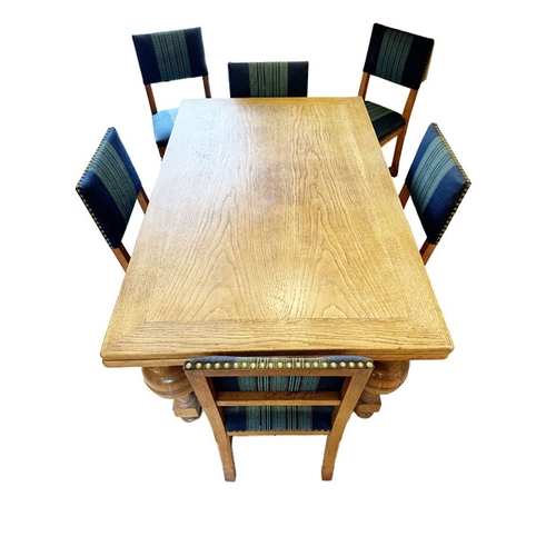 155 - A Danish Extendable Wooden Dining Room Table and Six Matching Upholstered Chairs