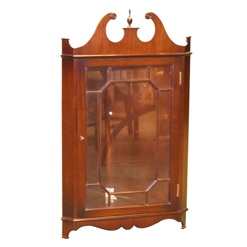 558 - A Mahogany Corner Cupboard