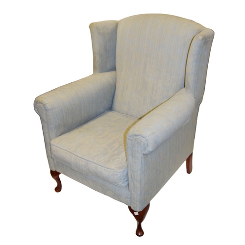 607 - A Good Upholstered Wing Backed Armchair