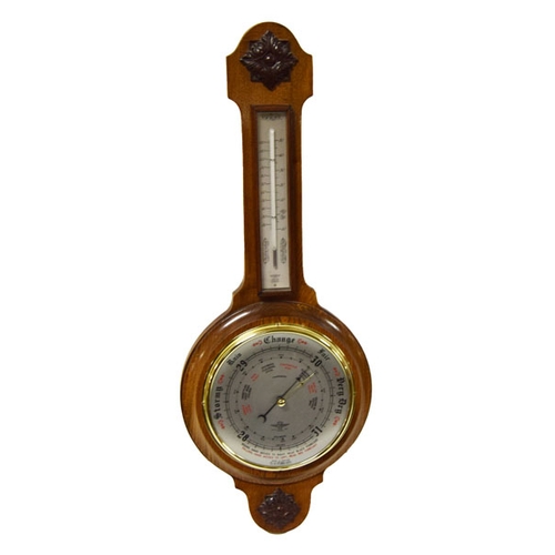 654 - An Oak Cased Barometer