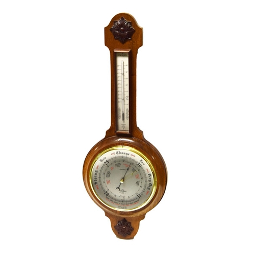 654 - An Oak Cased Barometer