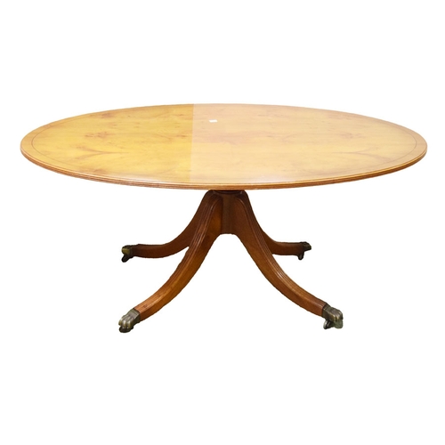 681 - A Nice Yew wood Oval Coffee Table on Centre Pedestal