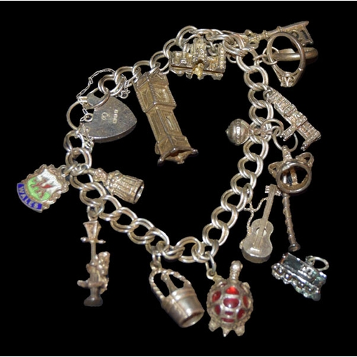 889 - A Very Nice Silver Charm Bracelet