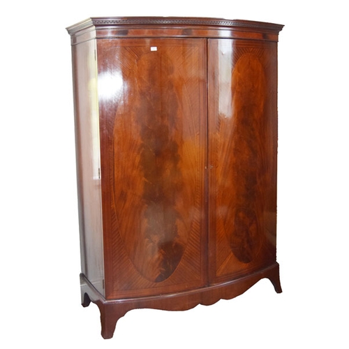 245 - An Inlaid Mahogany Bow Fronted Wardrobe