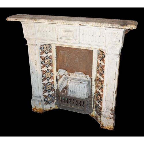 25 - A Cast Metal Fireplace with Tiled Inset
