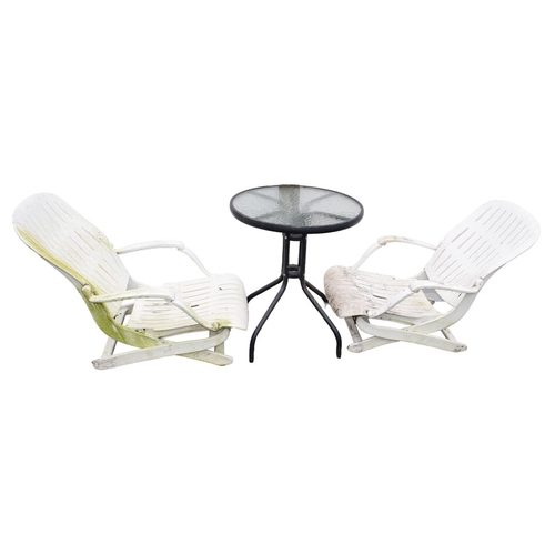 6 - A Lot of Two Sun Loungers and a Circular Table