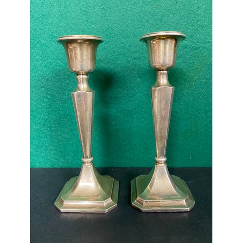 41 - Pair of Silver Candlesticks, Hallmarked one Birmingham one Chester