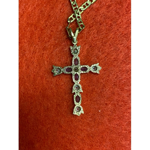 49 - 9ct gold chain and crucifix, featuring CZ's and purple stones (possibly amethyst) 8.5g total weight