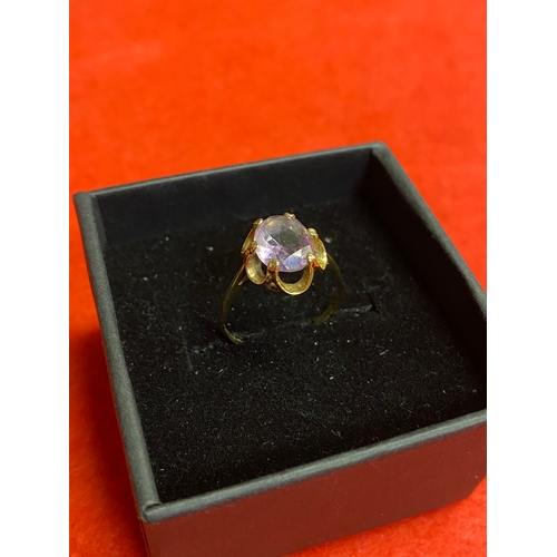 61 - 9ct gold ring size Q with purple stone, possibly amethyst