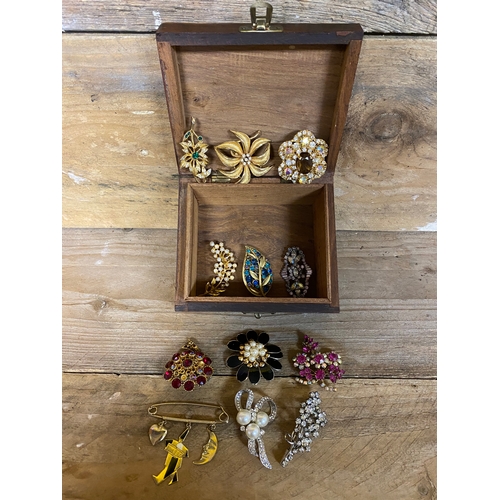 67 - Collection of 12 Vintage Brooches with Inlayed Wooden Box. Some missing stones