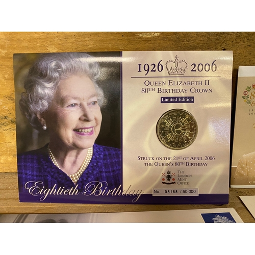 75 - Four Commemorative Queen Elizabeth Coins