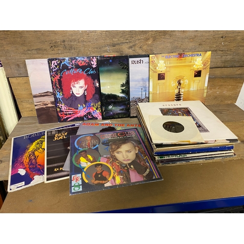 134 - Collection of 12 inch Vinyl to Include Robert Plant, Rush and Fleetwood Mac