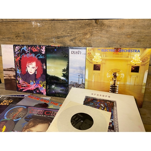 134 - Collection of 12 inch Vinyl to Include Robert Plant, Rush and Fleetwood Mac