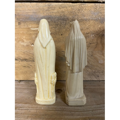 216 - Pair of Resin Religious Figures with a Decorative Painted Wooden Crucifix