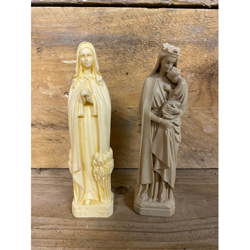 216 - Pair of Resin Religious Figures with a Decorative Painted Wooden Crucifix