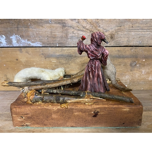 304 - Taxidermy Diorama on Wooden Base, creative license has been used to produce this eccentric display p... 