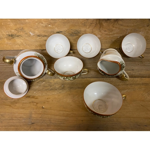 341 - Hand Painted Oriental Tea Set, 5 cups, 6 saucers, 6 side plates, teapot, milk jug, sugar bowl - Geis... 