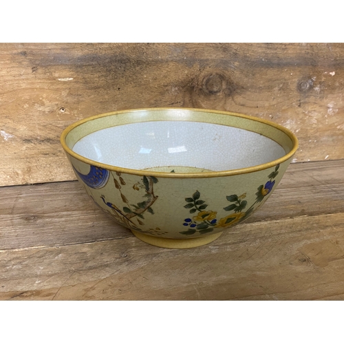 376 - Oriental Ceramic Bowl Depicting a Performing Musician and Flowers