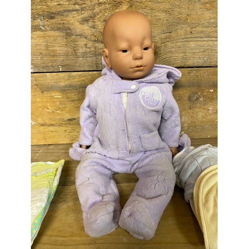 423 - Real Care Baby 3 Infant Simulator Doll, untested. Supplied with one piece and pictured clothing.