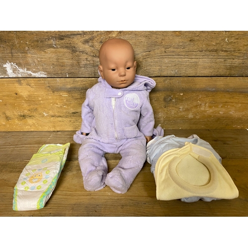 423 - Real Care Baby 3 Infant Simulator Doll, untested. Supplied with one piece and pictured clothing.