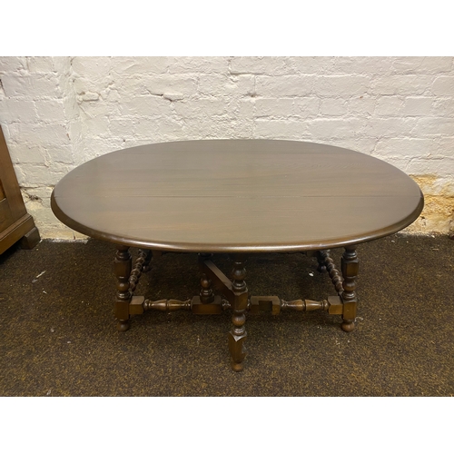 485 - Ercol Solid Wood Drop Leaf Six Legged Coffee Table