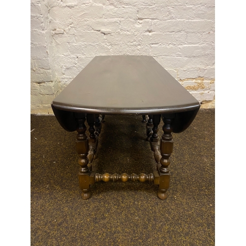 485 - Ercol Solid Wood Drop Leaf Six Legged Coffee Table