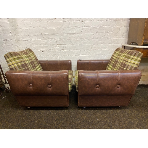 493 - Pair of Mid Century Brown Vinyl Button Side Club Chairs on Casters, small splits on the arms