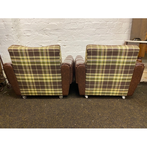 493 - Pair of Mid Century Brown Vinyl Button Side Club Chairs on Casters, small splits on the arms